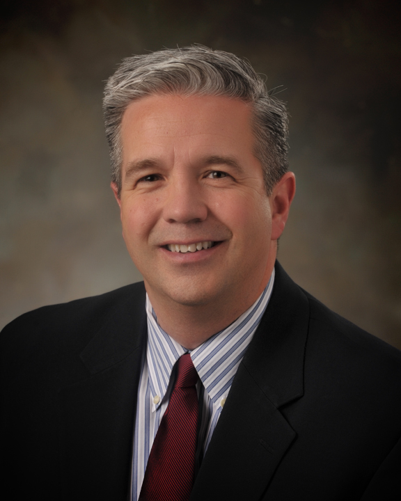 JOE HOLLAND, CHIEF EXECUTIVE OFFICER